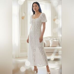 Elegant Zara dress features a unique knotted round neckline and charming